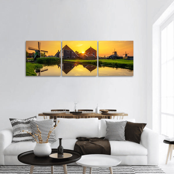 Sunset above farm houses panoramic canvas wall art