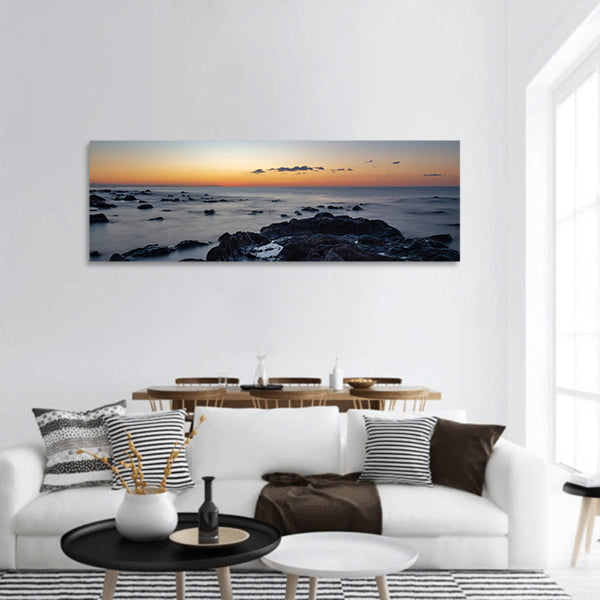 Sunrise at Palmasera beach panoramic canvas wall art