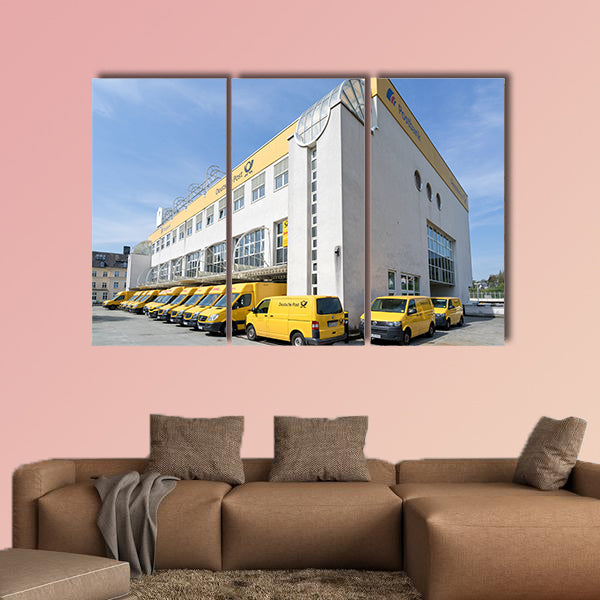 DHL delivery vans at depot multi panel canvas wall art