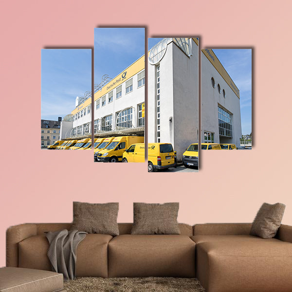 DHL delivery vans at depot multi panel canvas wall art