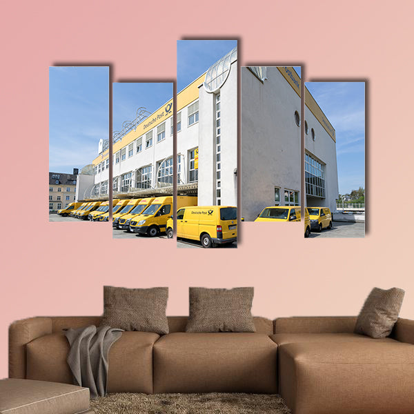 DHL delivery vans at depot multi panel canvas wall art