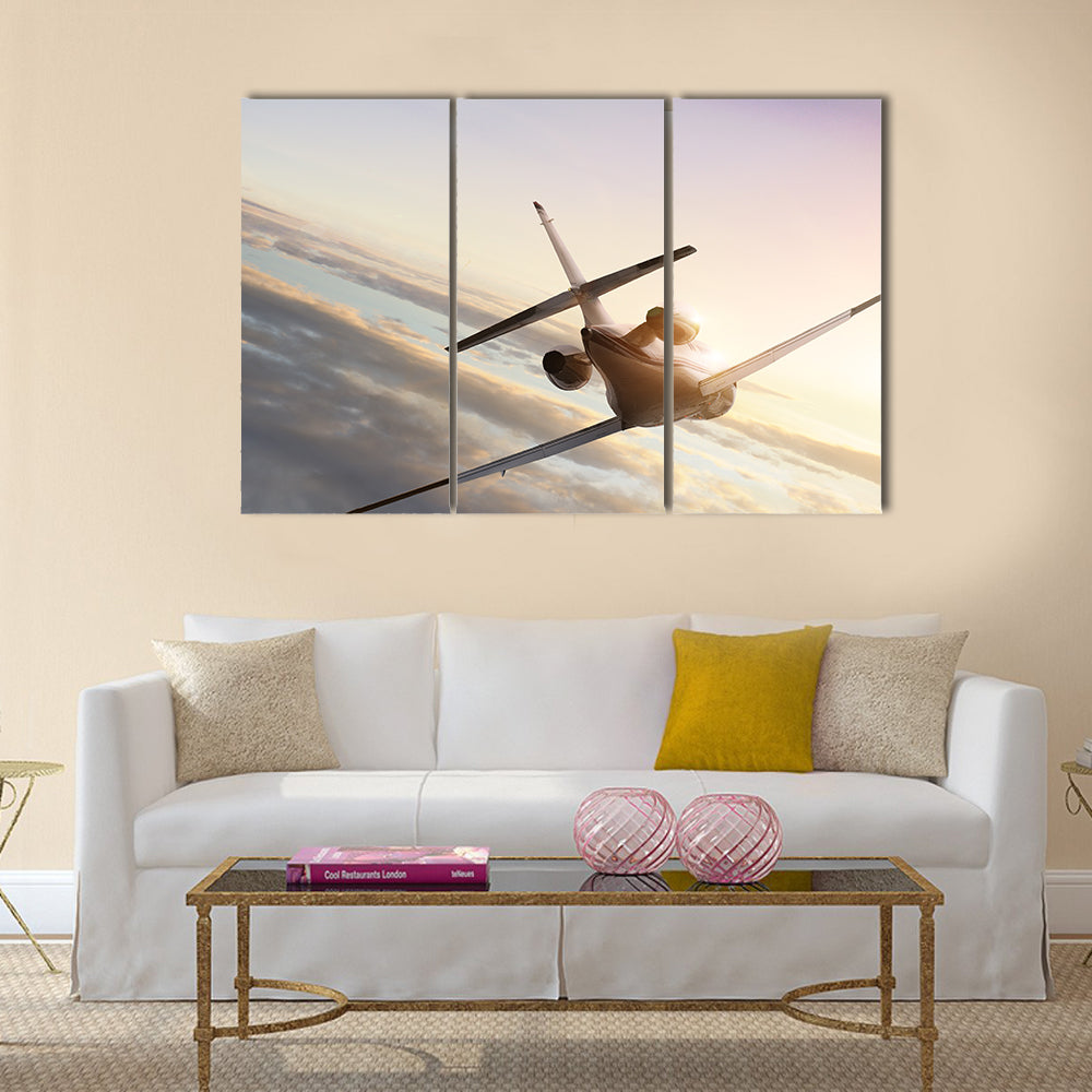 Commercial airliner flying in high sky multi panel canvas wall art