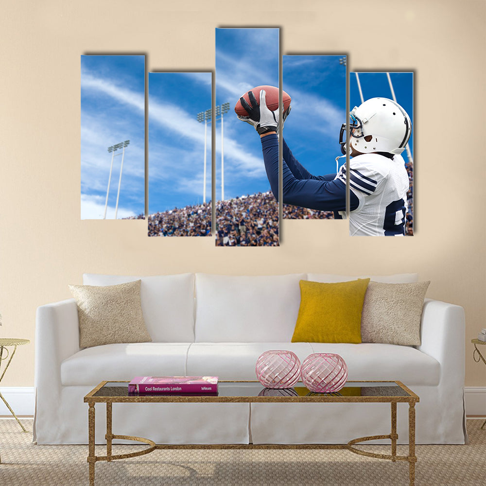 Football Player catching a touchdown pass Multi panel canvas wall art