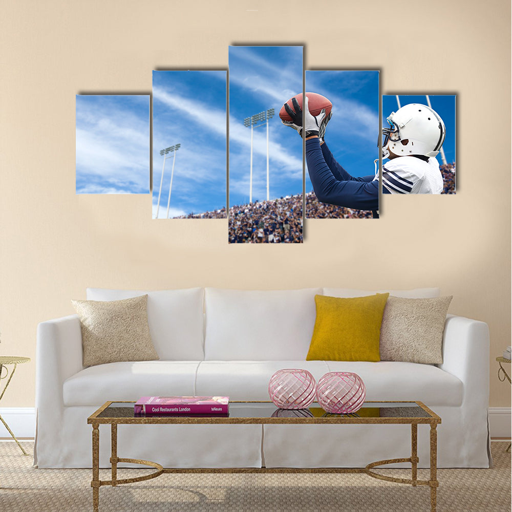 Football Player catching a touchdown pass Multi panel canvas wall art