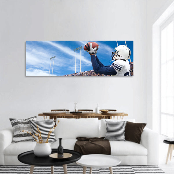 Football Player catching a touchdown pass panoramic canvas wall art