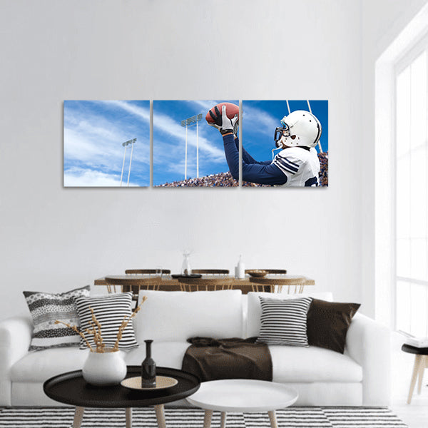 Football Player catching a touchdown pass panoramic canvas wall art