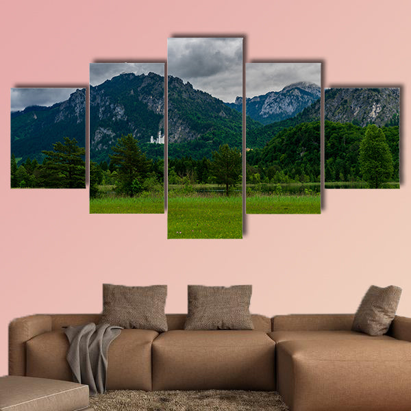 Castle Called Neuschwanstein with much trees and mountains wall art
