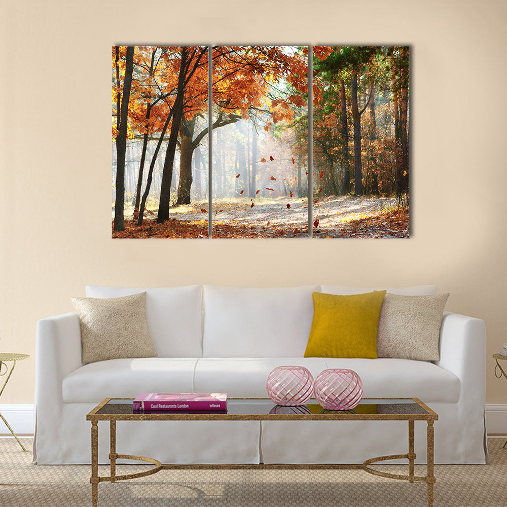 Falling oak leaves on the scenic autumn forest Multi panel canvas wall art