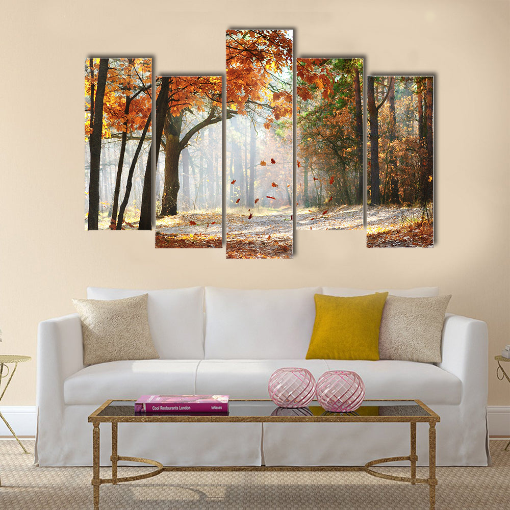 Falling oak leaves on the scenic autumn forest Multi panel canvas wall art