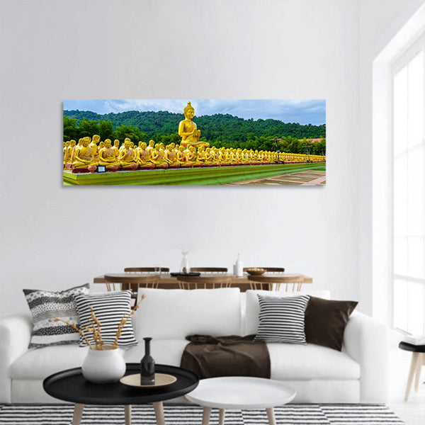Golden big Buddha statue at Makha Bucha Buddhist park panoramic canvas wall art