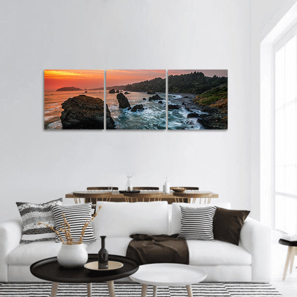 Sunset at a Rocky Beach panoramic canvas wall art.