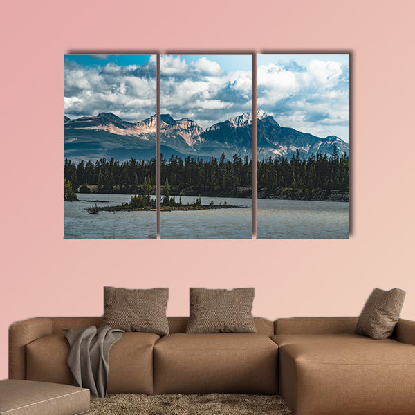 The Athabasca river flows by the Canadian rocky mountains wall art