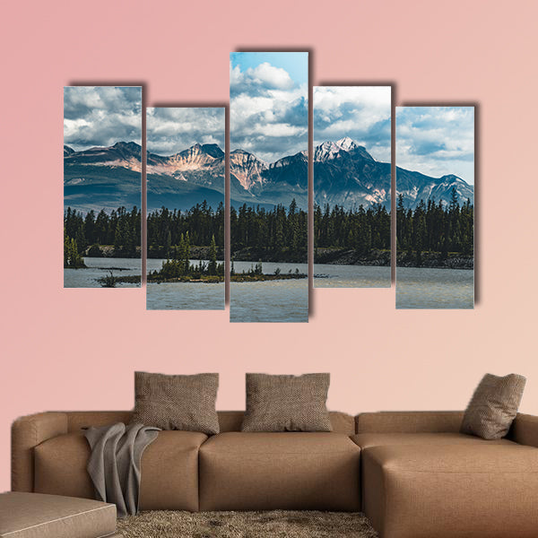 The Athabasca river flows by the Canadian rocky mountains wall art