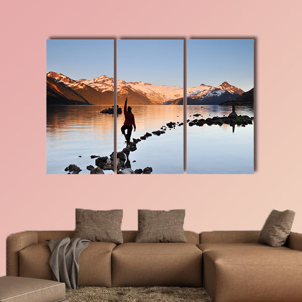 Yoga Girl balancing on rock, Garibaldi Lake sunset Multi panel canvas wall art