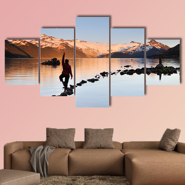 Yoga Girl balancing on rock, Garibaldi Lake sunset Multi panel canvas wall art