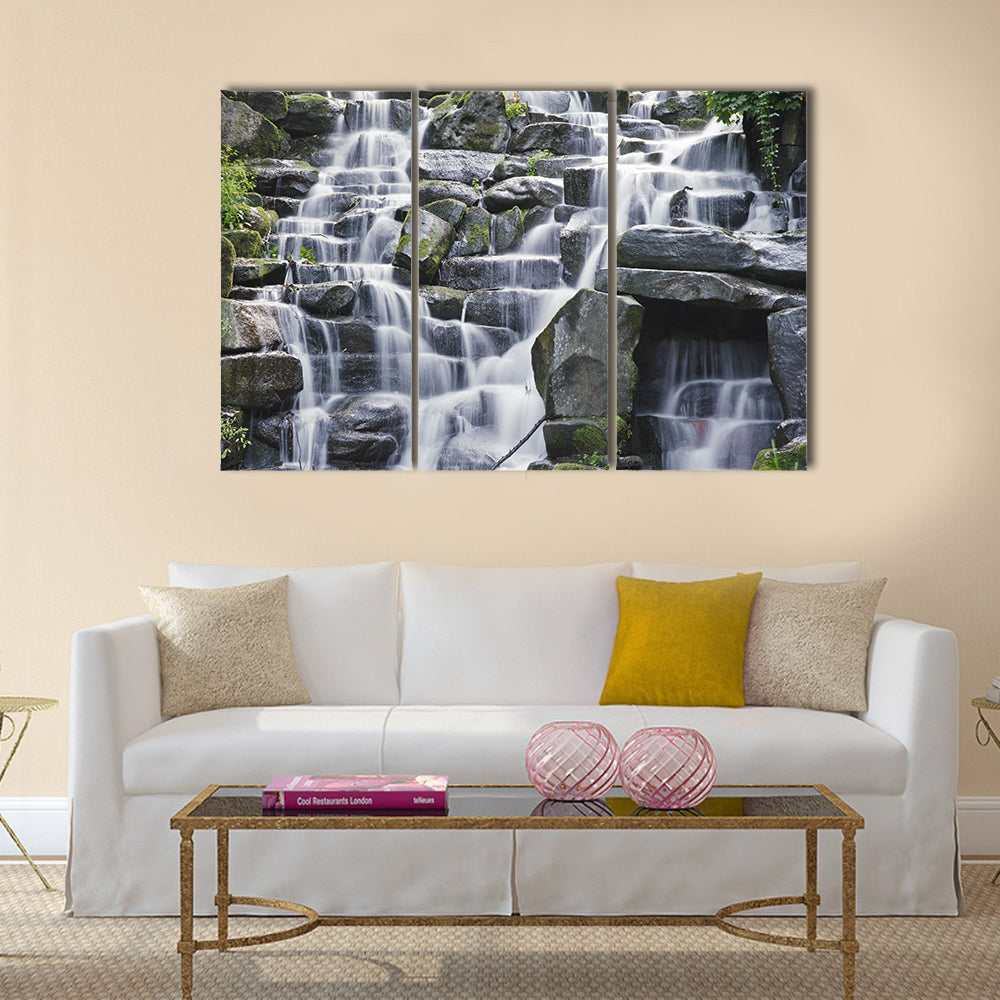 Waterfall cascades flowing over flat rocks Multi Panel Canvas Wall Art