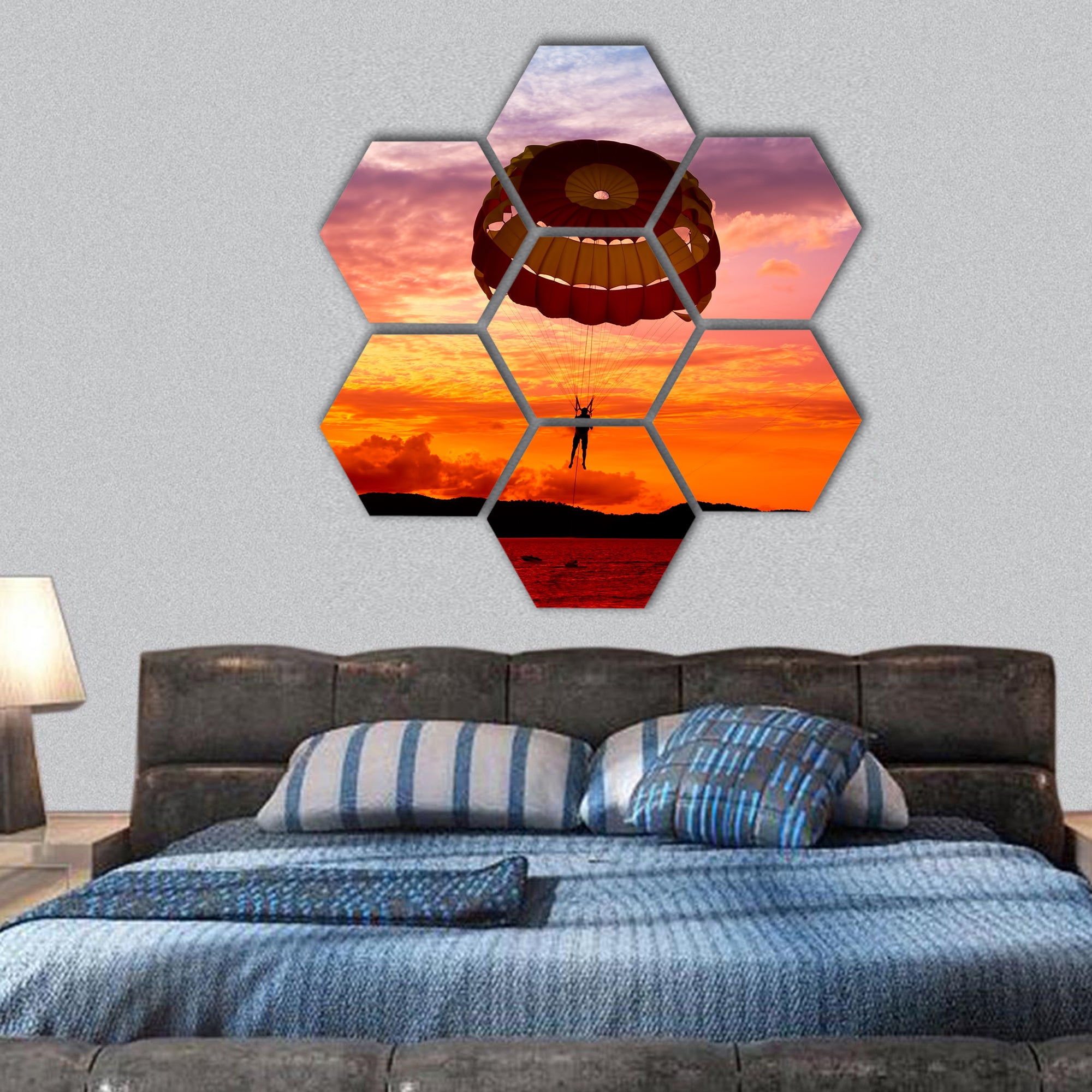 Silhouette of a para-sailors at sunset hexagonal canvas wall art
