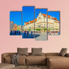 Colorful houses at Rynek, the picturesque square in multi panel canvas wall art