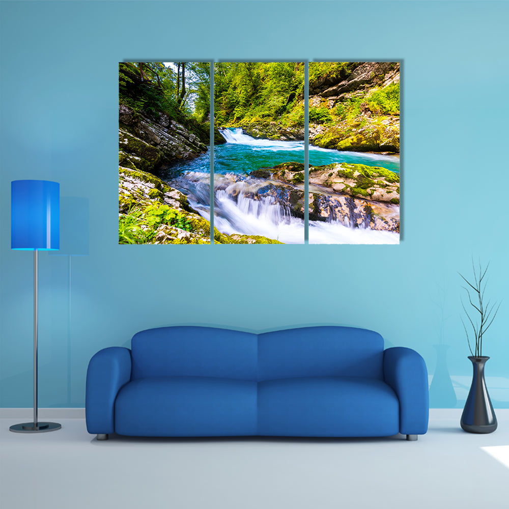 River near the Bled Lake with wooden tourist paths and bridges above river and waterfalls Multi Panel Canvas Wall Art