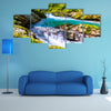 River near the Bled Lake with wooden tourist paths and bridges above river and waterfalls Multi Panel Canvas Wall Art