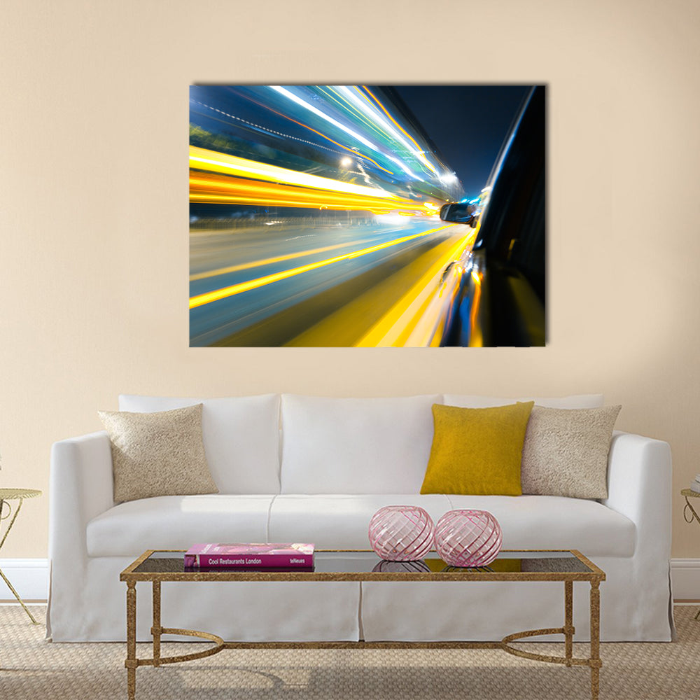 View from Side of Car Going Around Corner Multi Panel Canvas Wall Art