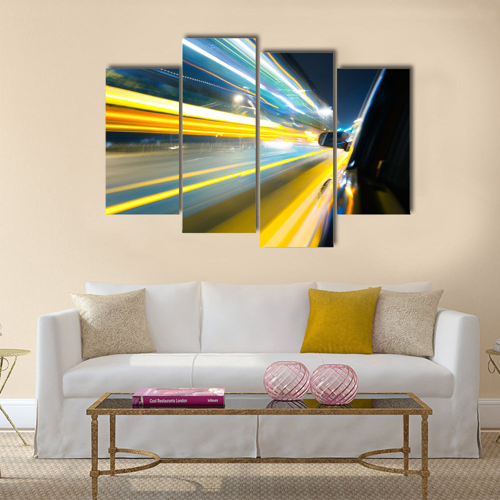 View from Side of Car Going Around Corner Multi Panel Canvas Wall Art