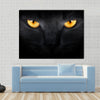 Muzzle a cat on a black background Multi panel canvas wall art