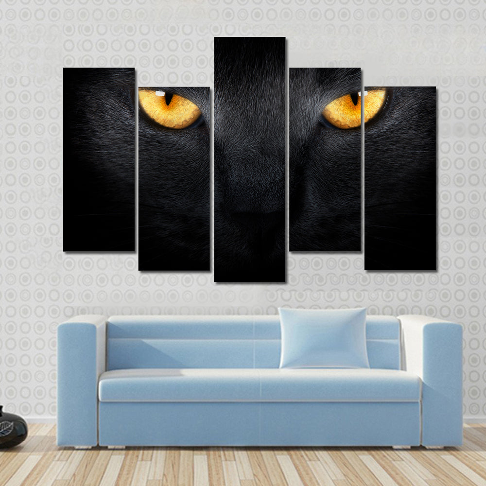 Muzzle a cat on a black background Multi panel canvas wall art