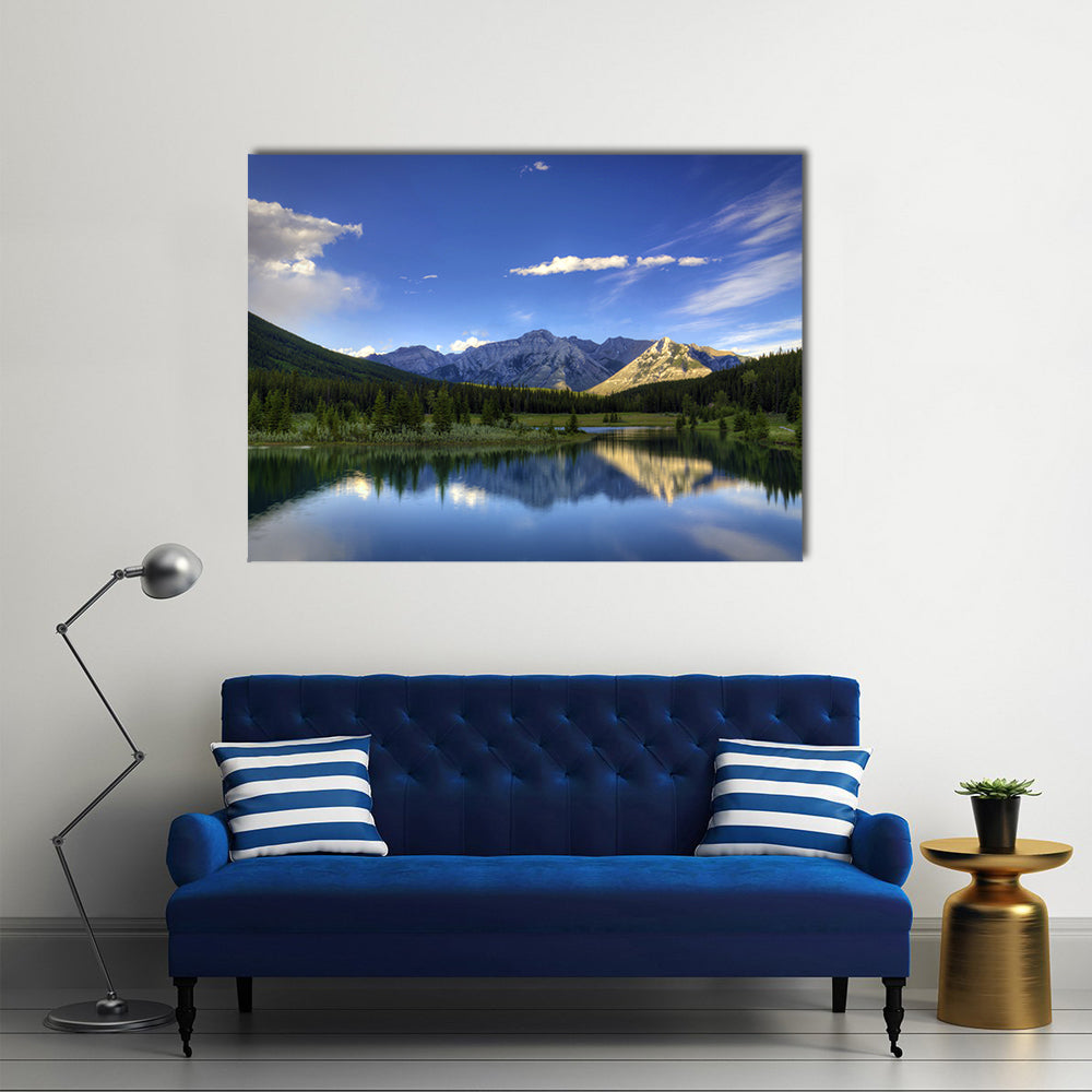 Reflections in the water at Cascade Ponds near Banff in Banff National Park Canada multi panel canvas wall art