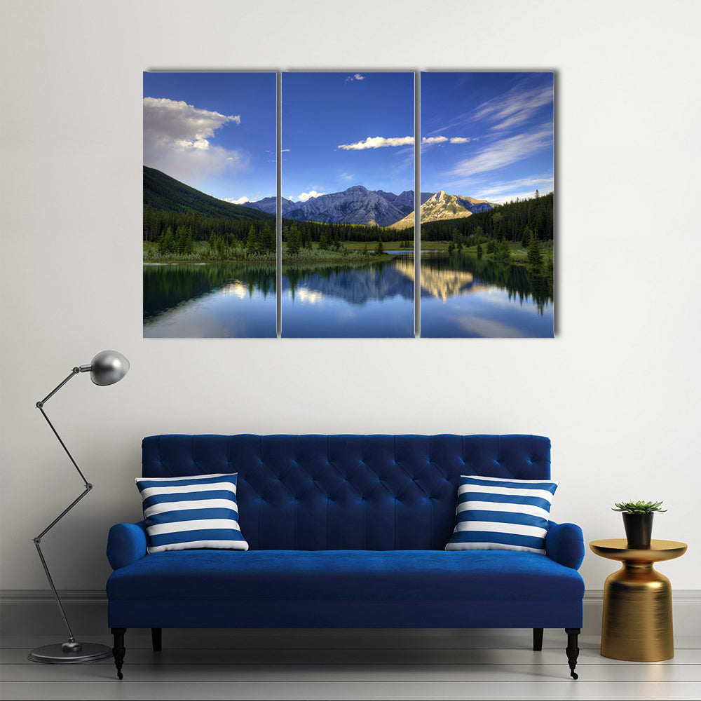 Reflections in the water at Cascade Ponds near Banff in Banff National Park Canada multi panel canvas wall art