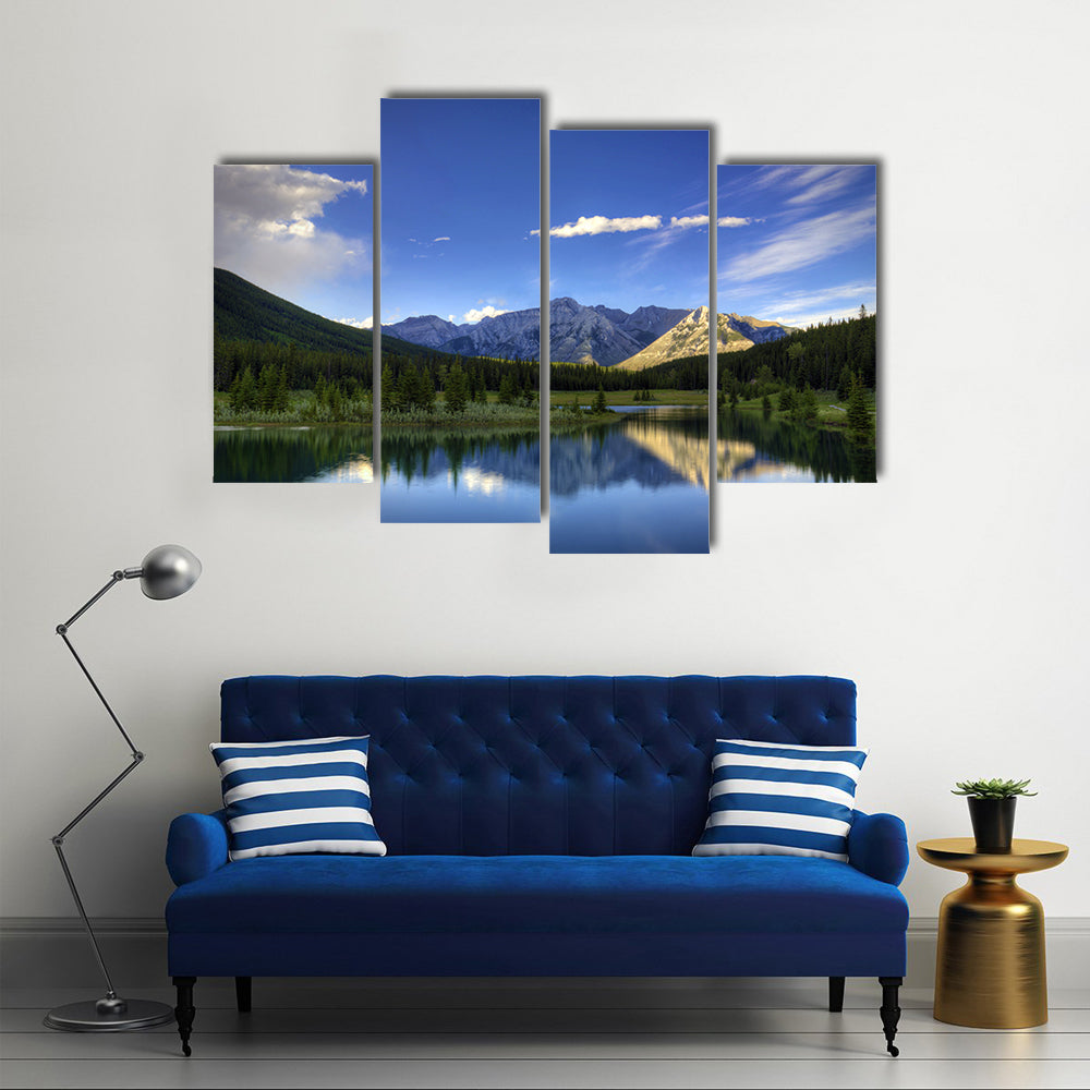 Reflections in the water at Cascade Ponds near Banff in Banff National Park Canada multi panel canvas wall art