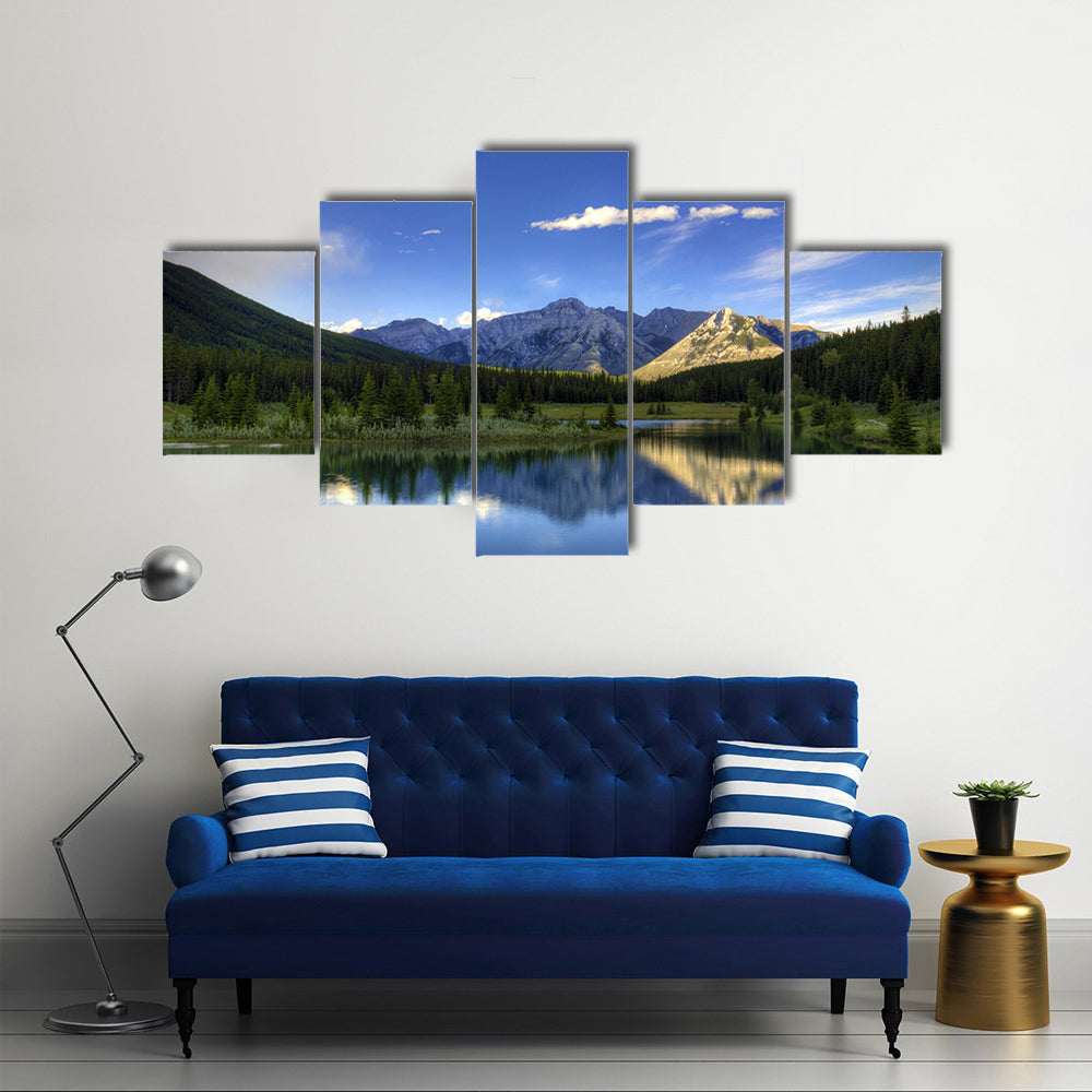 Reflections in the water at Cascade Ponds near Banff in Banff National Park Canada multi panel canvas wall art