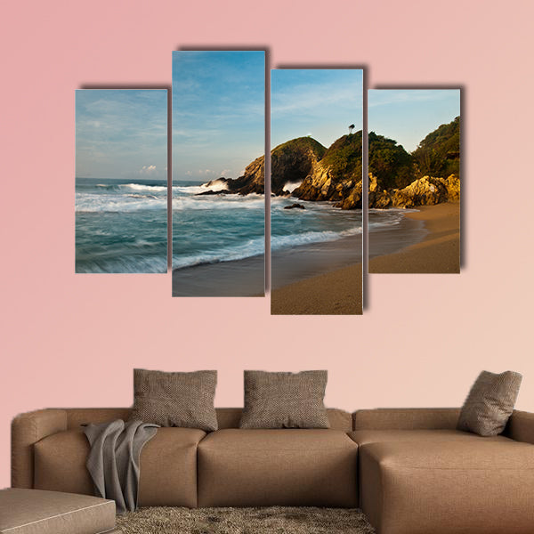 Sandy beach with rocks at sunrise multi panel canvas wall art