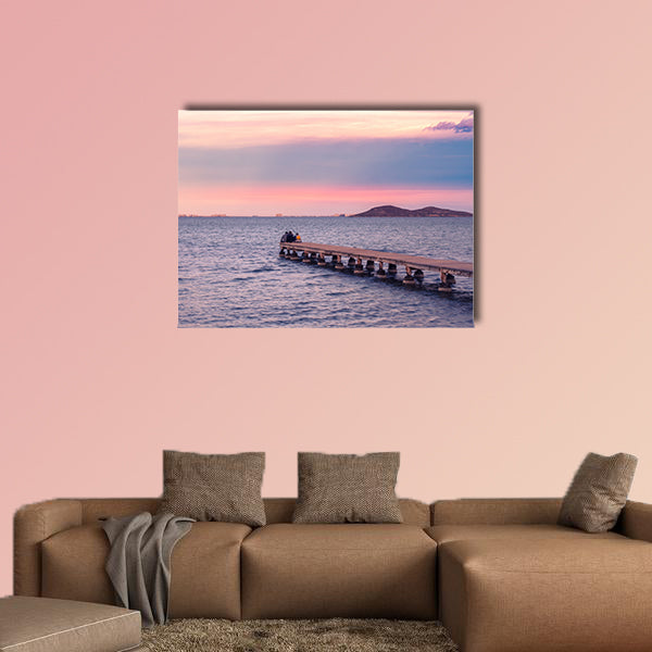  Friends enjoying sunset from a jetty on the Mar Menor wall art