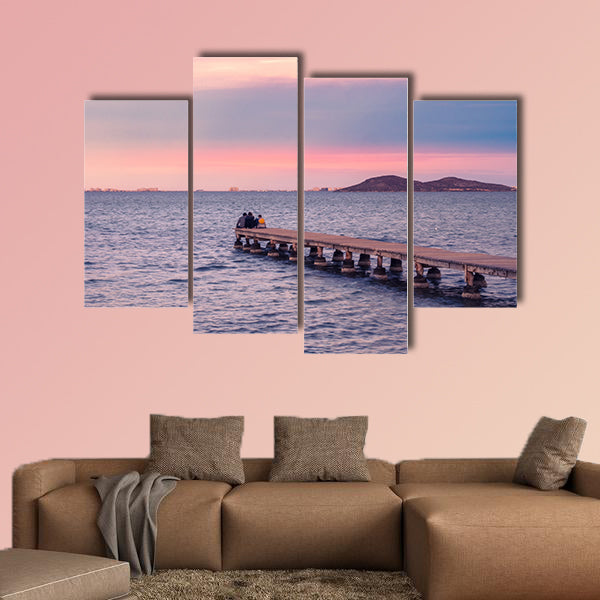  Friends enjoying sunset from a jetty on the Mar Menor wall art