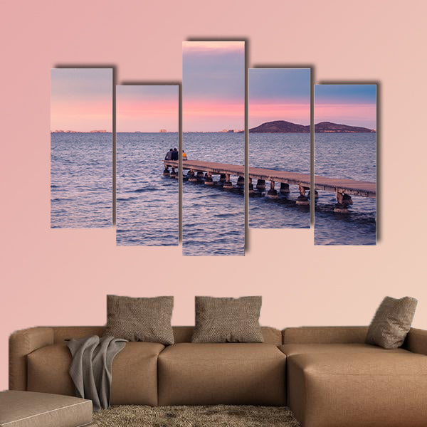  Friends enjoying sunset from a jetty on the Mar Menor wall art