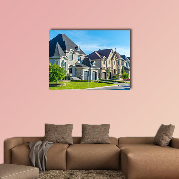 Luxury house in Montreal, Canada against blue sky multi panel canvas wall art
