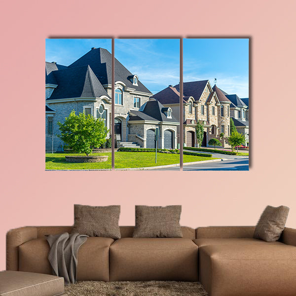 Luxury house in Montreal, Canada against blue sky multi panel canvas wall art