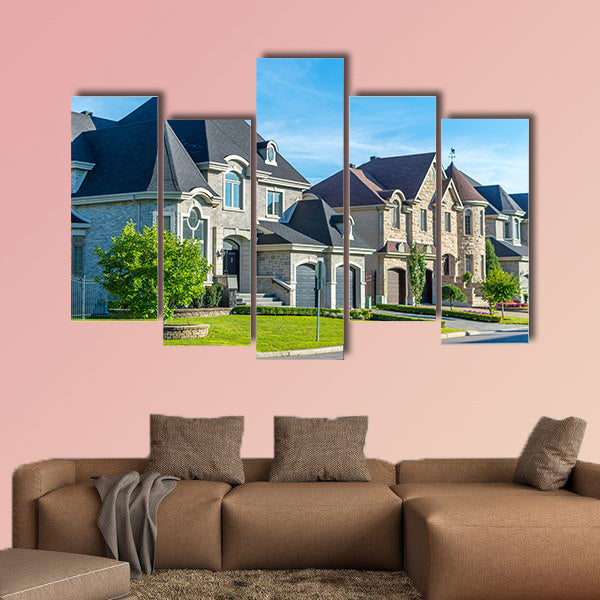 Luxury house in Montreal, Canada against blue sky multi panel canvas wall art