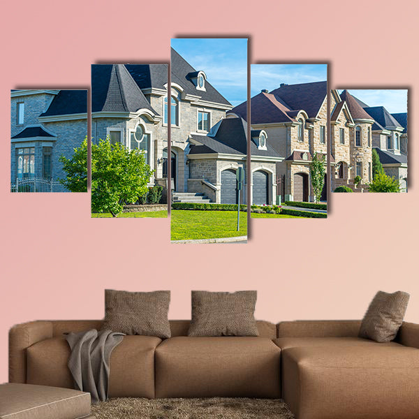 Luxury house in Montreal, Canada against blue sky multi panel canvas wall art