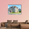 Luxury house in Montreal, Canada against blue sky multi panel canvas wall art