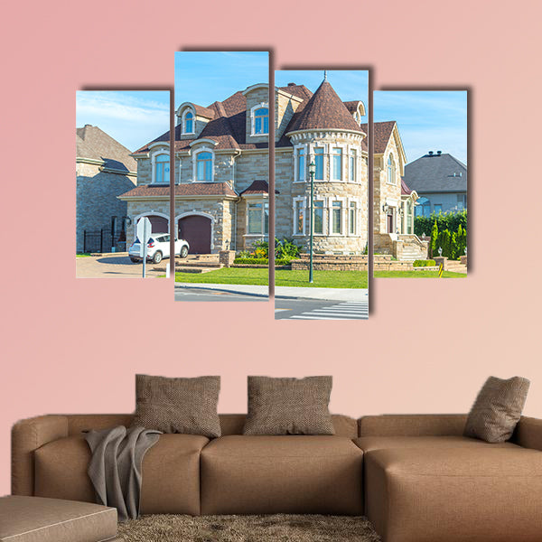 Luxury house in Montreal, Canada against blue sky multi panel canvas wall art