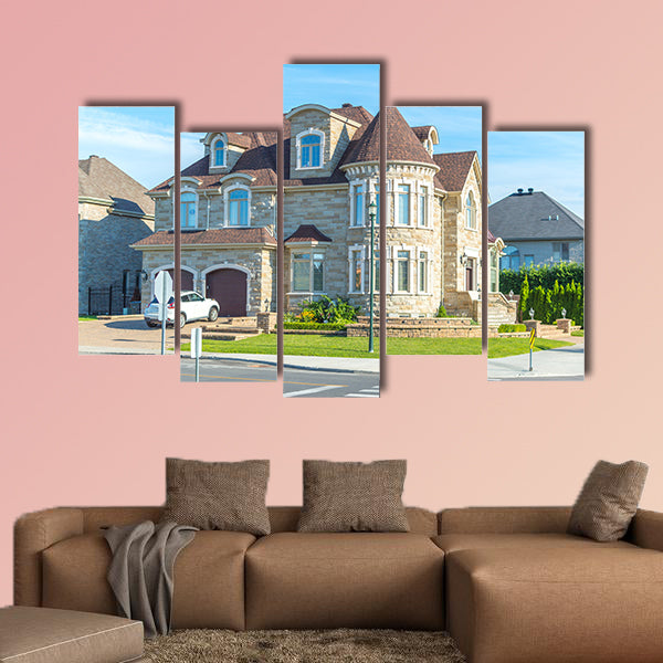 Luxury house in Montreal, Canada against blue sky multi panel canvas wall art