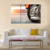 Part of a luxury motorcycle with blurry asphalt road Multi panel canvas wall art