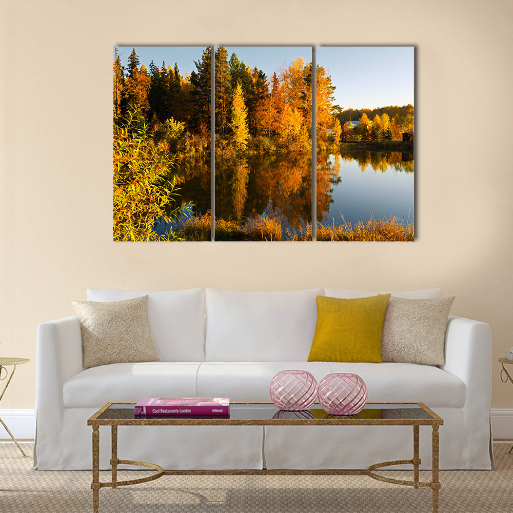 Lake in sunset rays. Autumn landscape multi panel canvas wall art