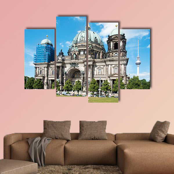 People at the Lustgarten Park in Berlin, Germany, in front of the Berliner wall art