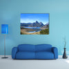 Beautiful mountain landscape with small lake in Spain multi panel canvas wall art