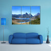 Beautiful mountain landscape with small lake in Spain multi panel canvas wall art