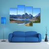 Beautiful mountain landscape with small lake in Spain multi panel canvas wall art