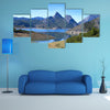 Beautiful mountain landscape with small lake in Spain multi panel canvas wall art